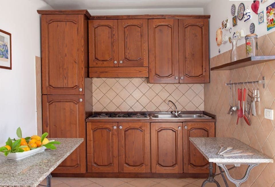 Villa | Private kitchen | Stovetop, cookware/dishes/utensils
