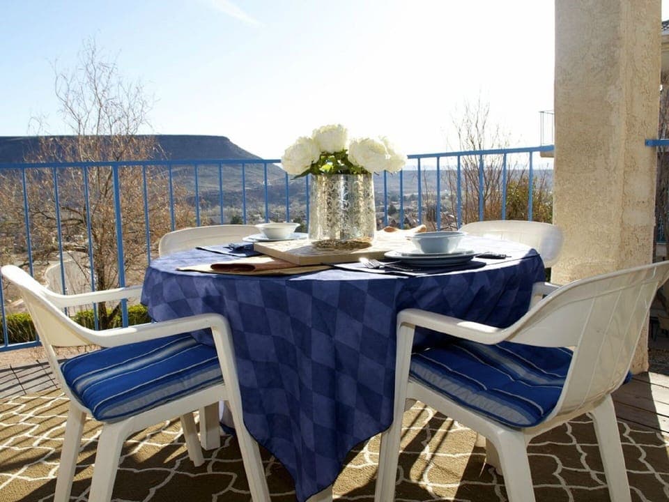 Enjoy eating out on the covered deck overlooking the lovely mountains and valley