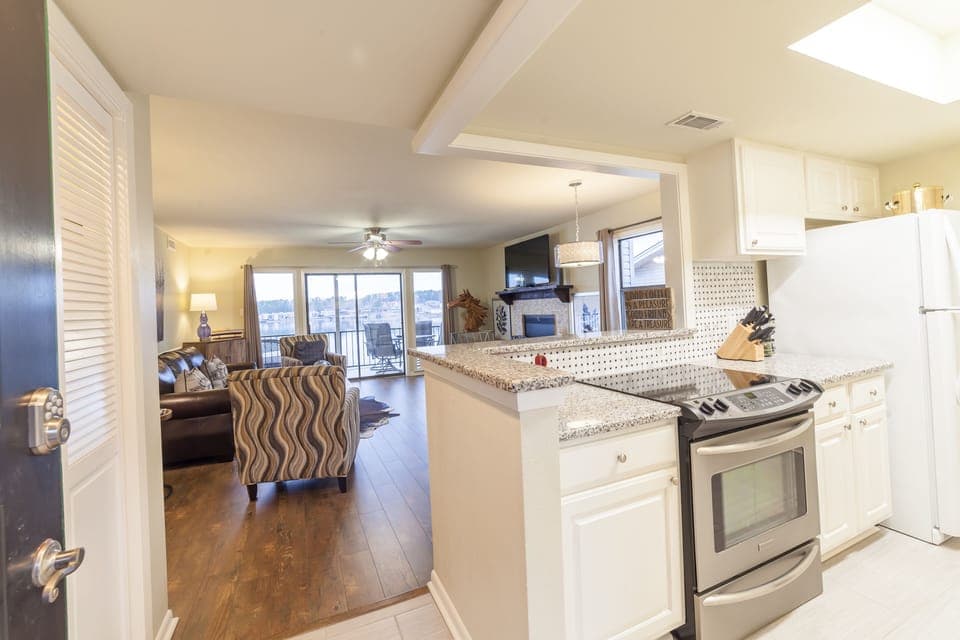 Walking in the front door, you're greeted with the open kitchen and living room.