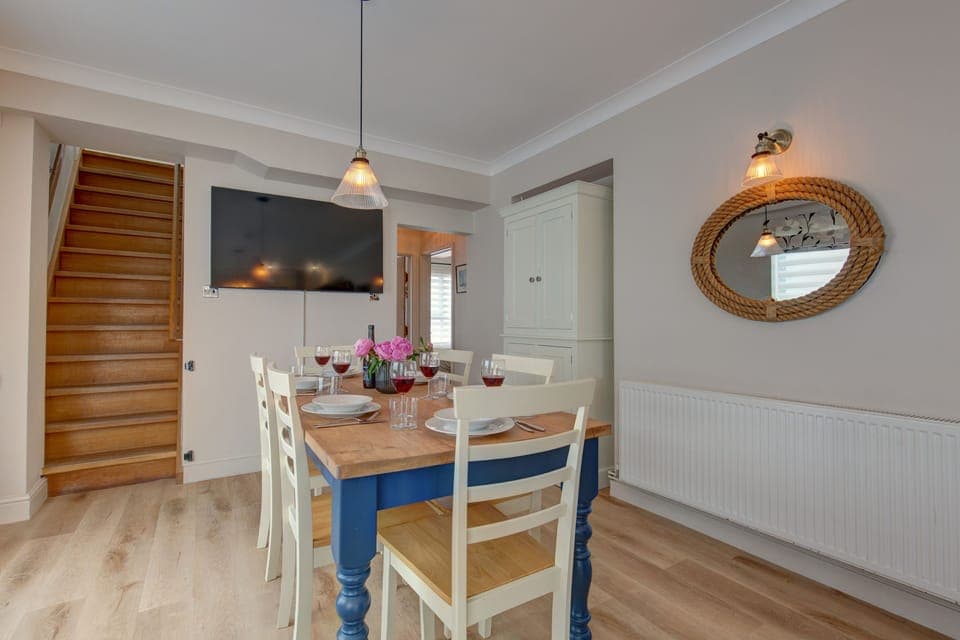 Ground floor: dining table with seating for six people