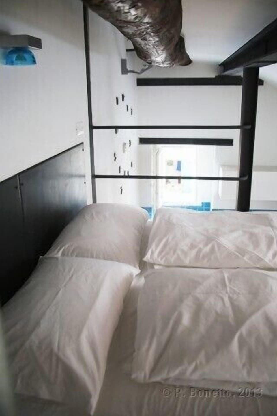 The double bed on the mezzanine