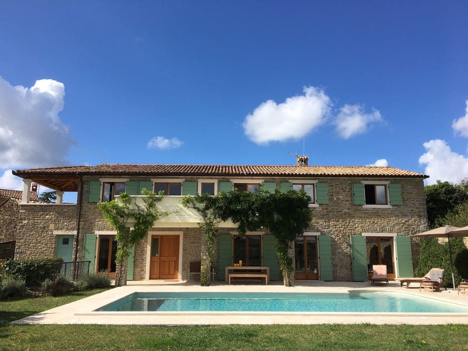 The front of the house showing the pool
