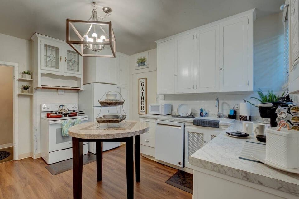 Open and bright, the kitchen provides everything you'll need to whip up a tasty meal.#stayrenostonehouse