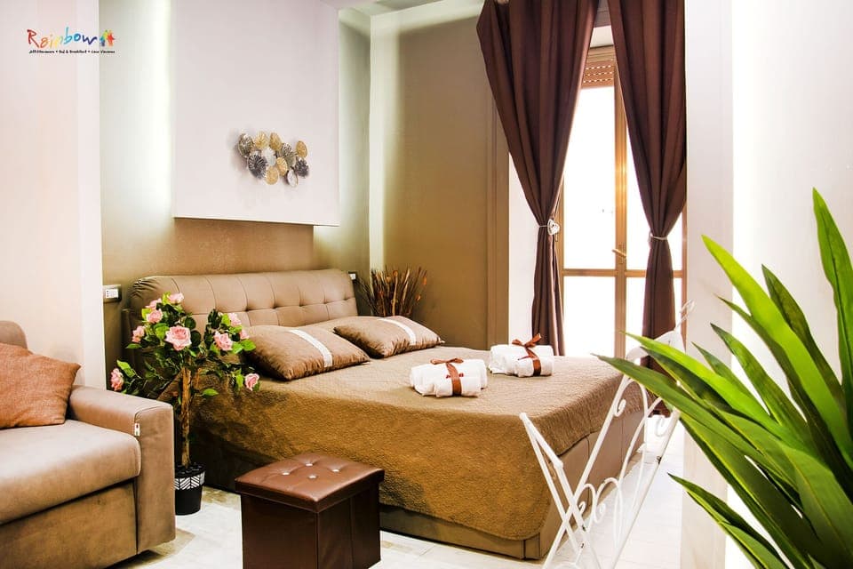 Deluxe Quadruple Room, Balcony, City View (Hug) | Free WiFi, bed sheets