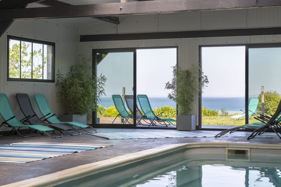 Indoor pool, open 7:00 AM to 10:00 PM, sun loungers