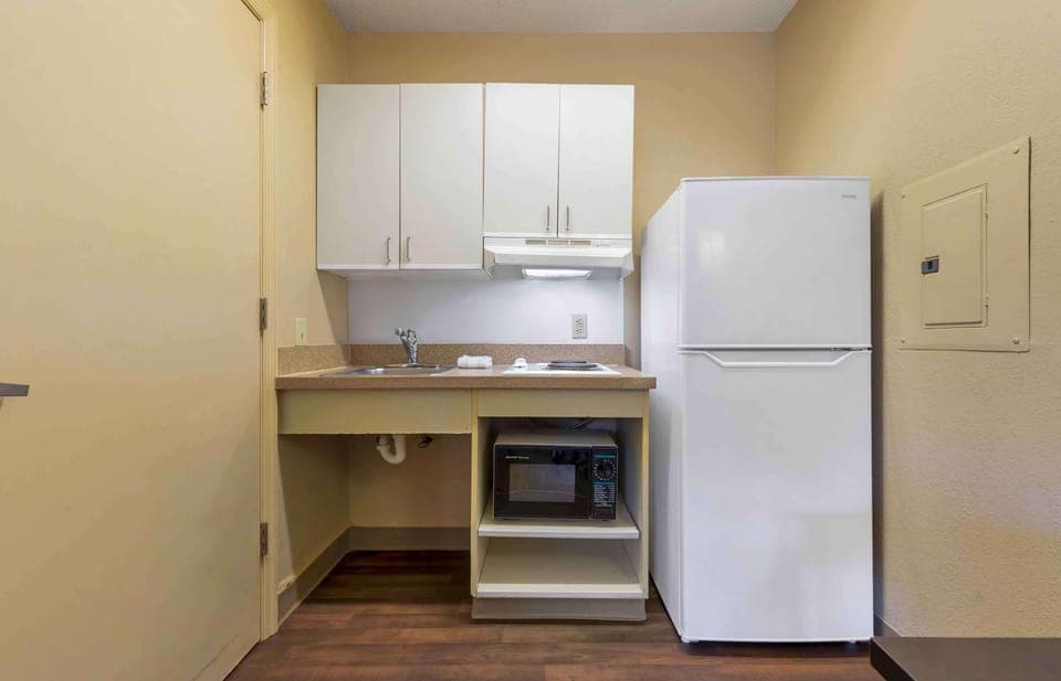 Studio, 1 Queen Bed, Accessible, Non Smoking | Private kitchen | Fridge, microwave, stovetop, cookware/dishes/utensils