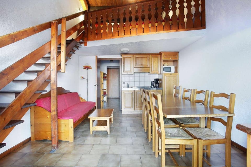 Prepare meals in the kitchenette and enjoy them at the dining table.