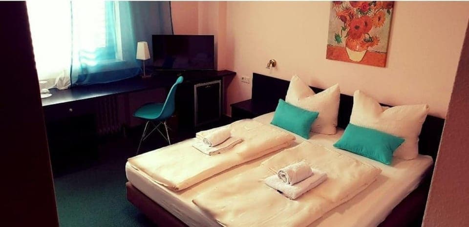 Desk, free WiFi, bed sheets