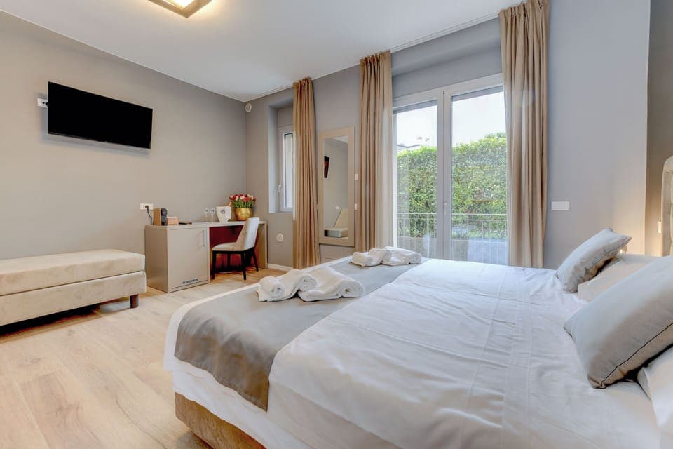 Superior Double Room | Down comforters, desk, laptop workspace, blackout drapes