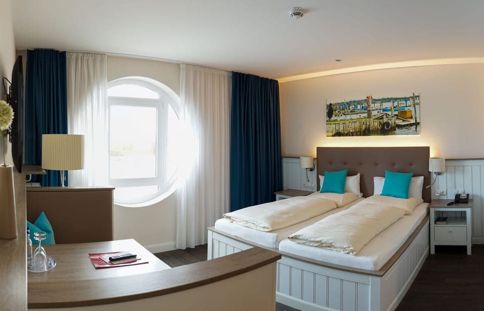 Hypo-allergenic bedding, desk, blackout drapes, iron/ironing board