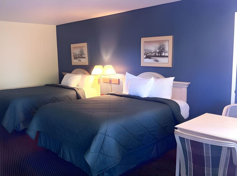 Room, 2 Queen Beds, Non Smoking | Desk, laptop workspace, blackout drapes, iron/ironing board