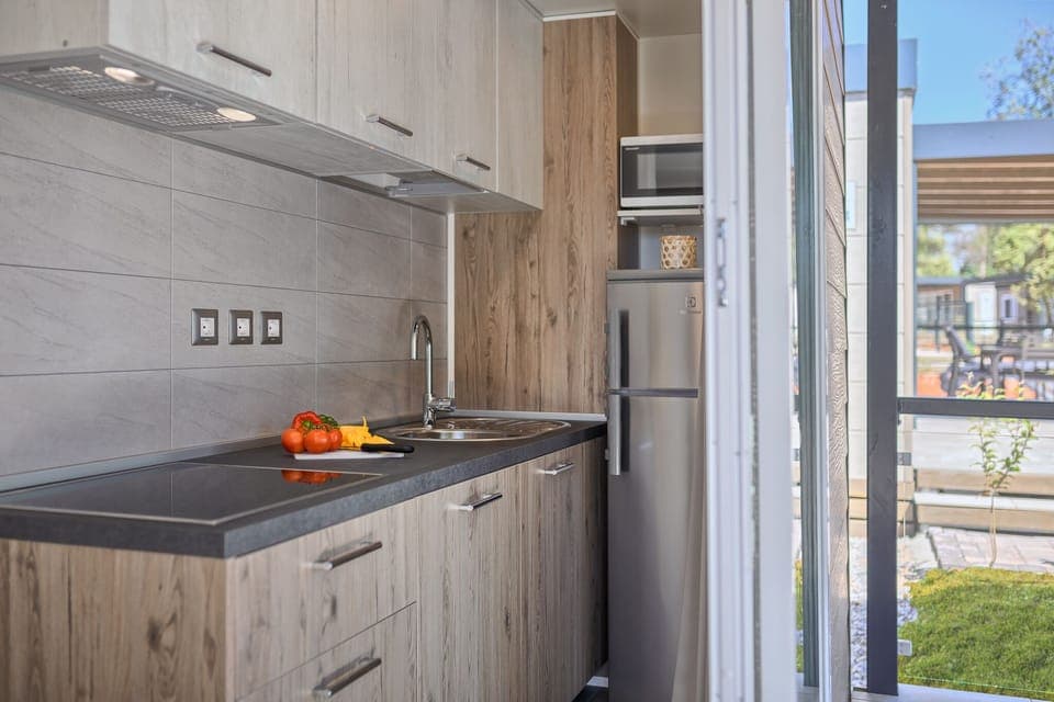 Family Mobile Home, 3 Bedrooms | Private kitchen | Fridge, stovetop, dishwasher, electric kettle