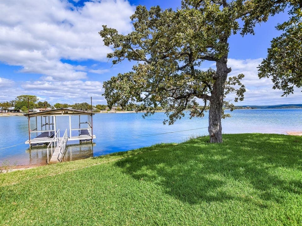 More lake views from the main house. This is your dock for playing, relaxing, and boating if you bring your boat or rent ours.