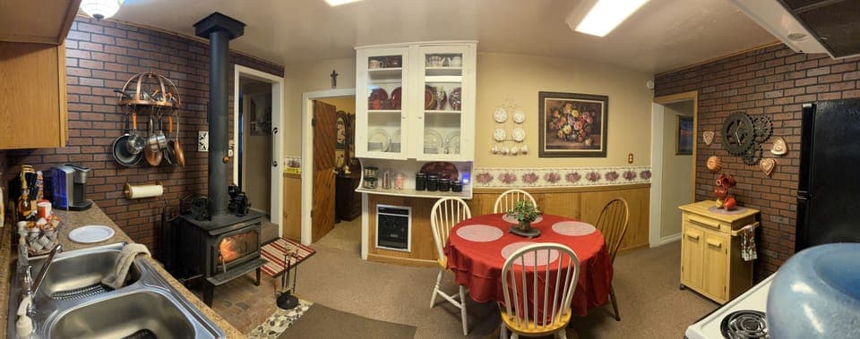 Full Kitchen  has electric heater and full size stove and refrigerator.