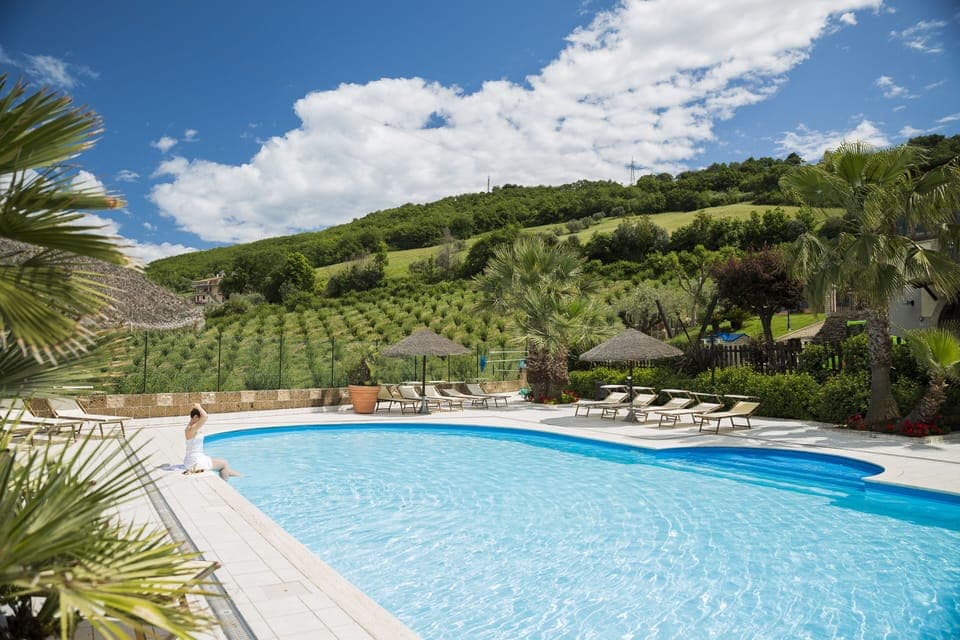 Seasonal outdoor pool, pool umbrellas, sun loungers