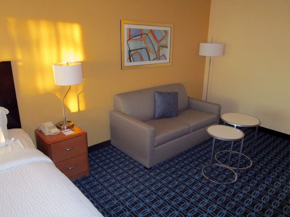 Room, 1 King Bed with Sofa bed | Living area | 34-inch flat-screen TV with cable channels, TV