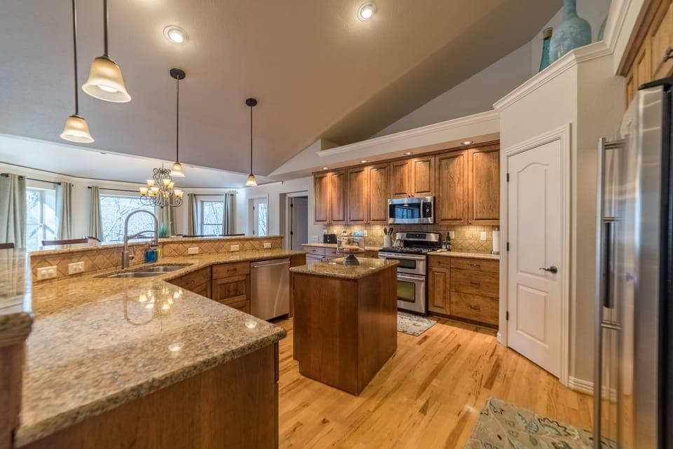 Kitchen with open concept to dining and living rooms 