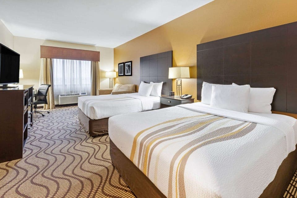 Deluxe Suite, 2 Queen Beds, Non Smoking | Premium bedding, desk, blackout drapes, iron/ironing board