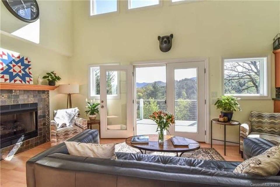 Relax in the living room while enjoying the fireplace and the view!