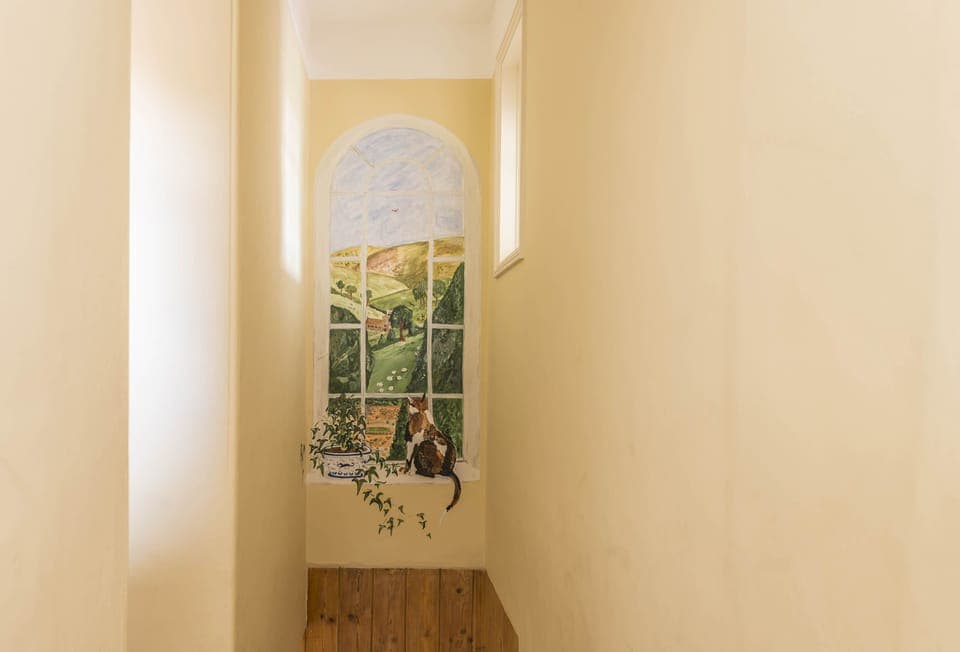 First floor: Beautiful painted mural of the gardens at Hearn Lodge