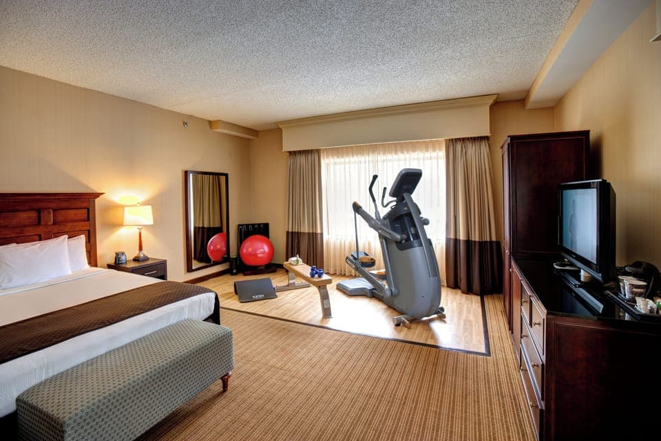 1 King Cardio Room with Precor Trainer | Premium bedding, pillowtop beds, in-room safe, desk