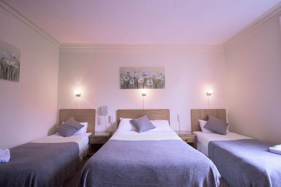 Standard Family Room (Sleeps 4) | Individually decorated, individually furnished, desk, iron/ironing board