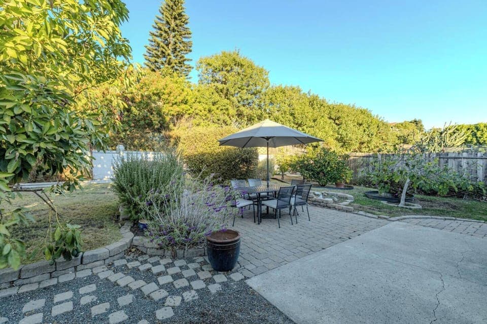 Enjoy this gorgeous green backyard when home.