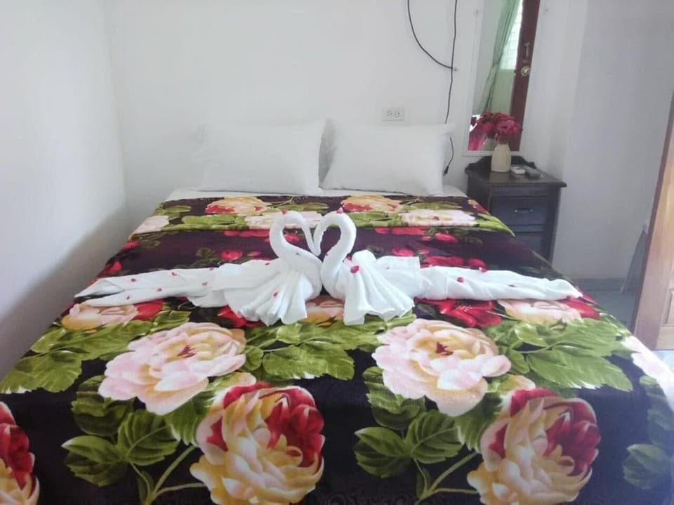 Blackout drapes, iron/ironing board, free WiFi, bed sheets