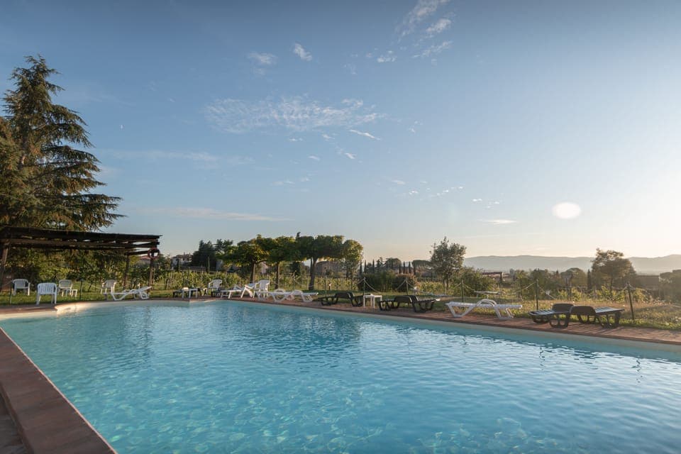 Seasonal outdoor pool, open 8 AM to 9 PM, pool umbrellas, sun loungers