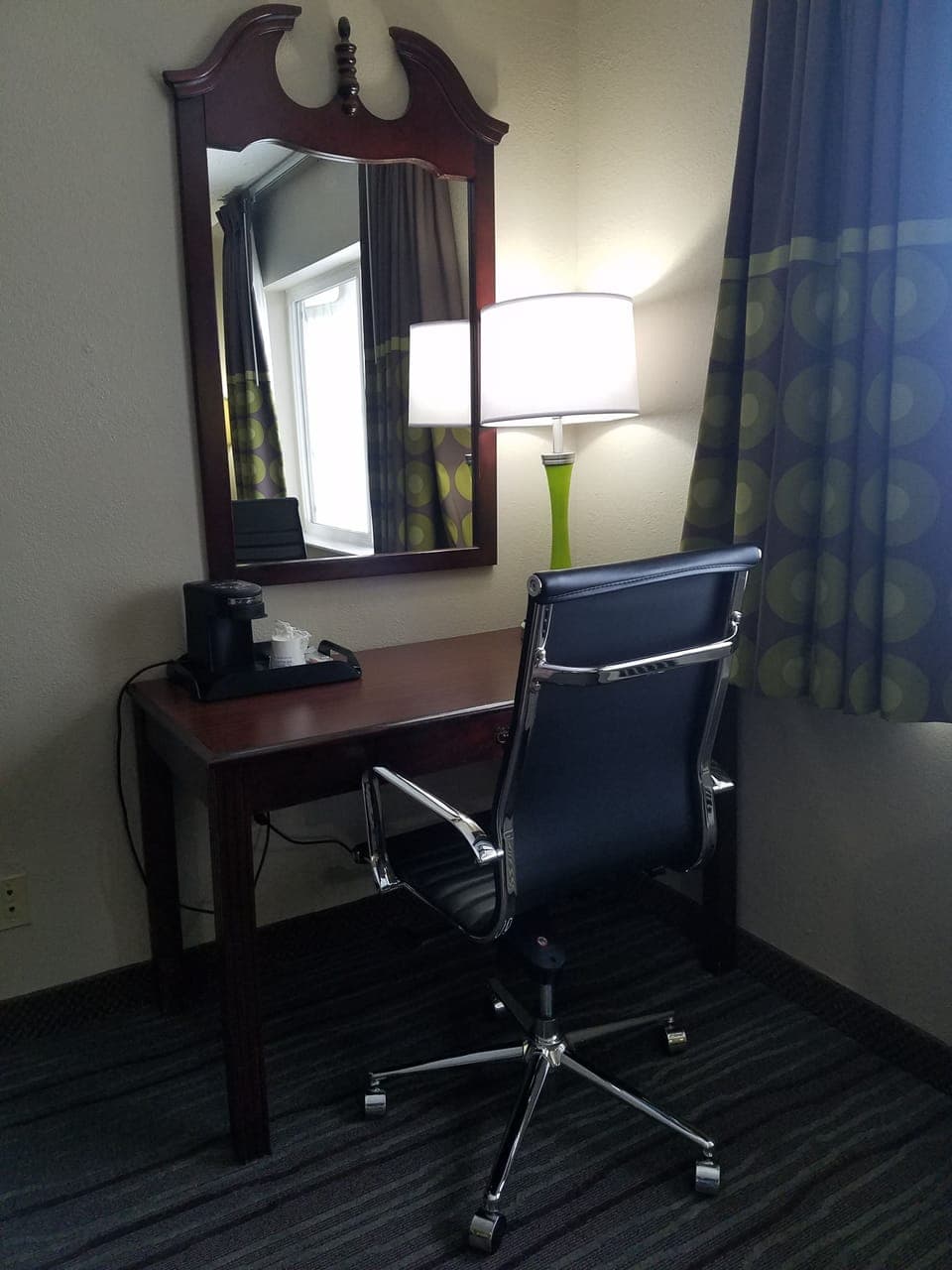 Desk, laptop workspace, blackout drapes, iron/ironing board