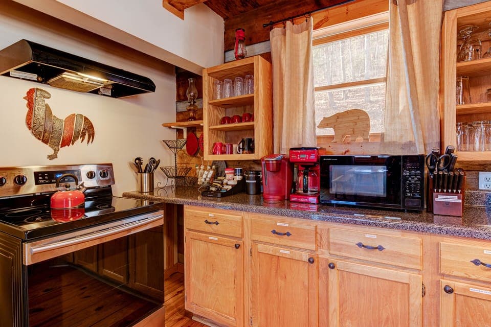 Various appliances, spices and coffee.  Plenty of countertop space.