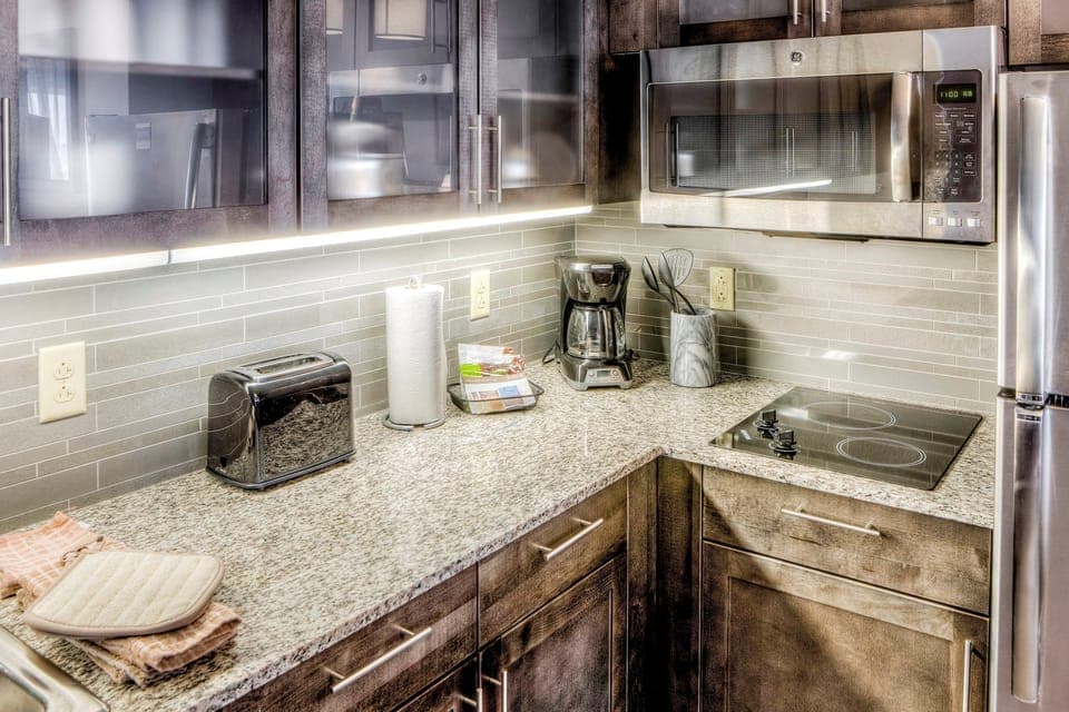 Prepare meals in the kitchen