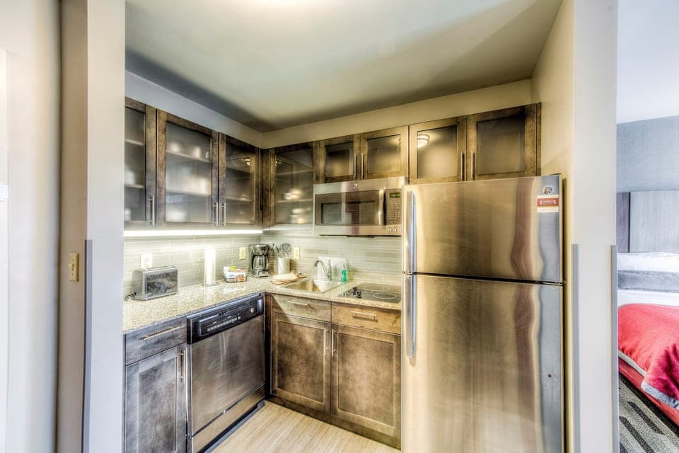 Prepare meals in the fully-equipped kitchen for added convenience.