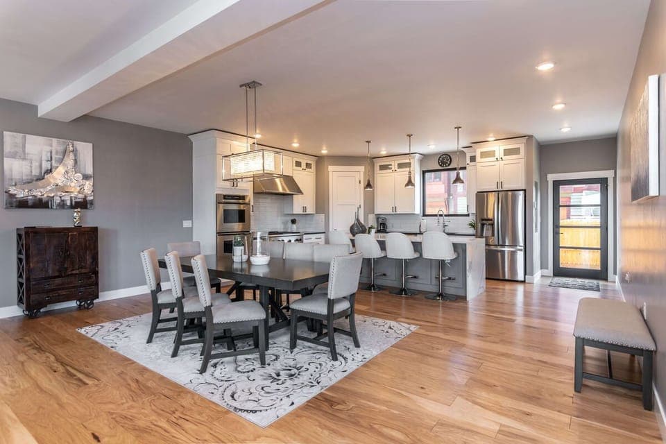 The modern open kitchen & dining room are ready for your next getaway