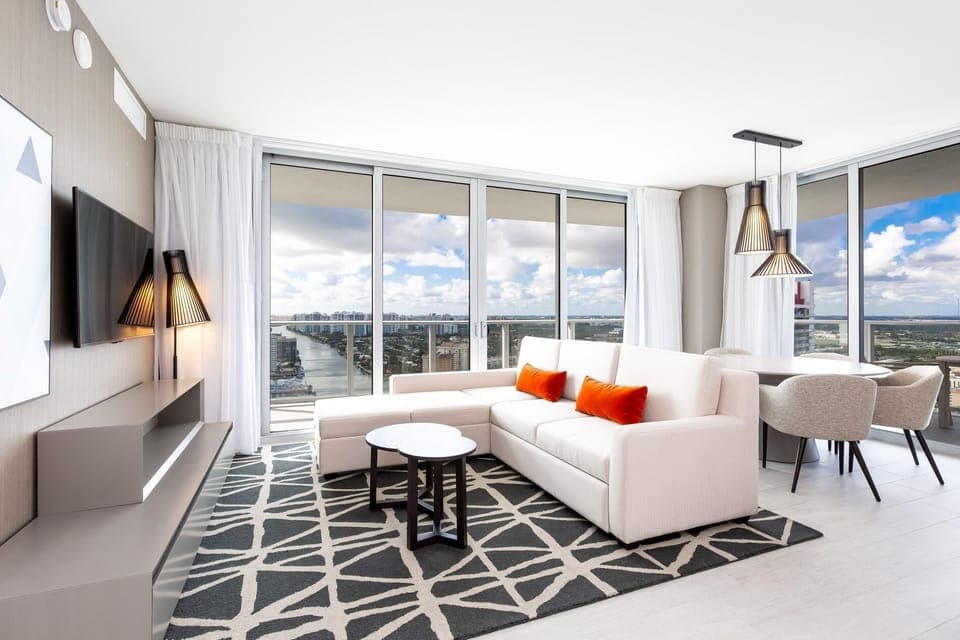 Soak in sunlit bliss and vibrant city views from your stylish haven.
