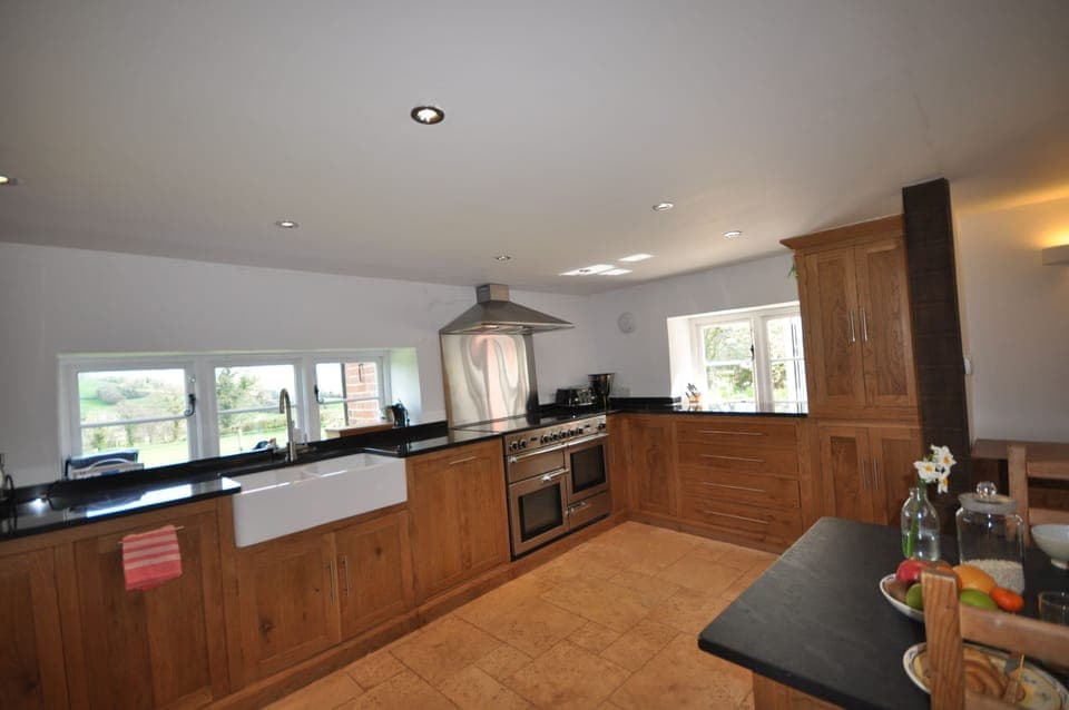 Cottage | Private kitchen | Stovetop, dishwasher, highchair, cookware/dishes/utensils