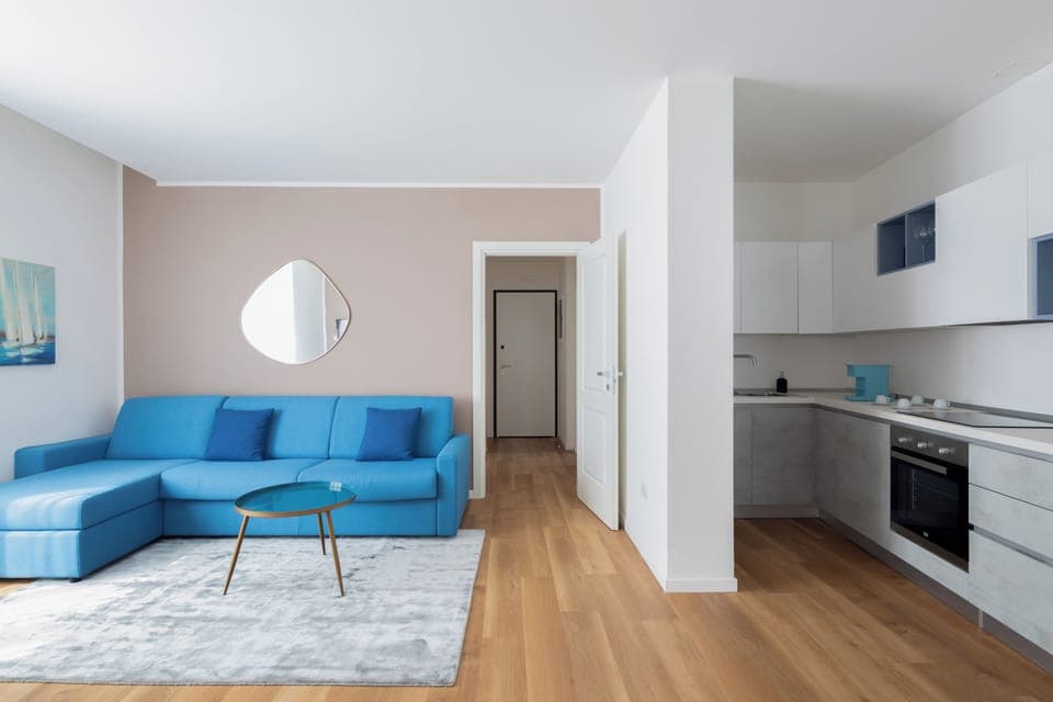 Family Aparthotel Annex - Pozzo del Mare | Living area | 55-inch flat-screen TV with satellite channels