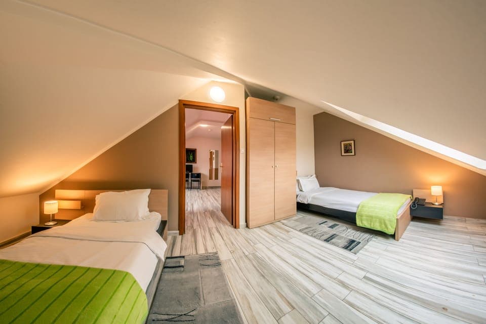 Memory foam beds, desk, laptop workspace, iron/ironing board