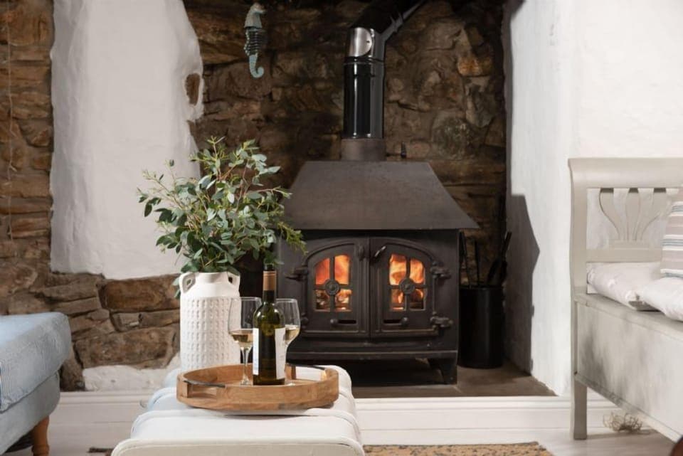 Roseneath, St Agnes. Ground floor: Snug with cosy wood burning stove