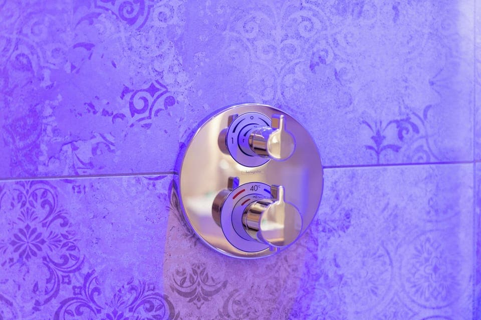 Shower, hydromassage showerhead, designer toiletries, hair dryer