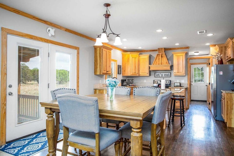 In the dining area, you'll have your choice of sitting around the table, or at the counter on bar-style seating!