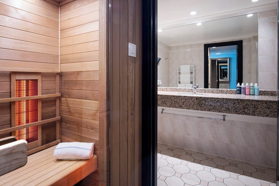 Eco-friendly toiletries, hair dryer, towels