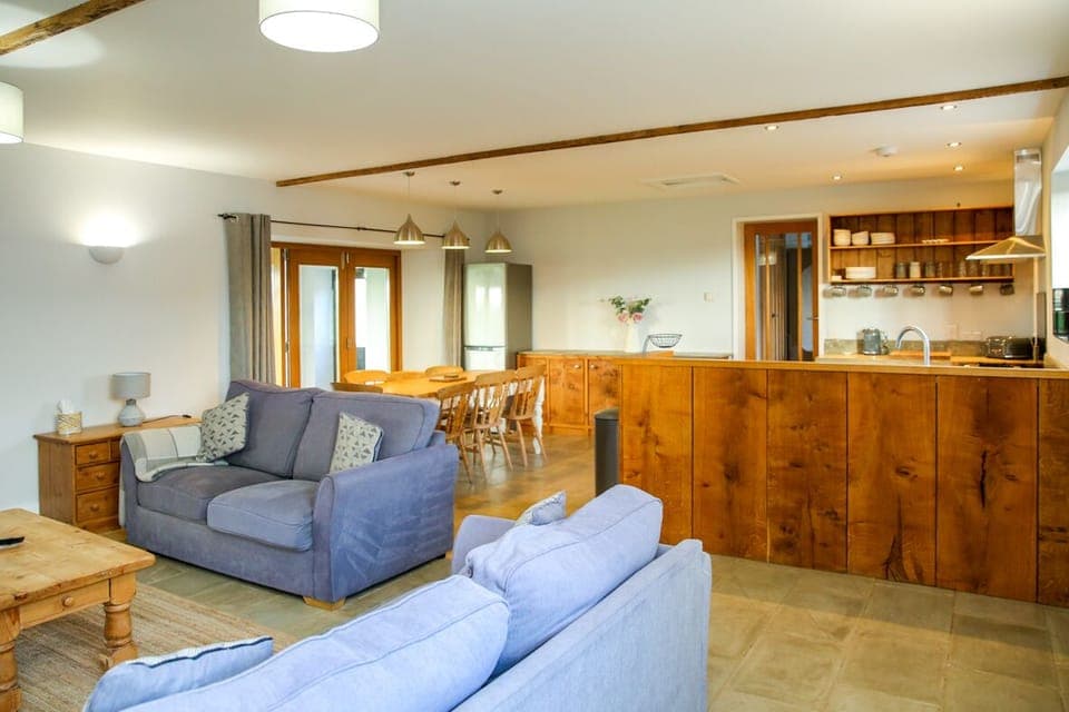 Comfort Bungalow | Living area | 37-inch flat-screen TV with digital channels, TV, fireplace