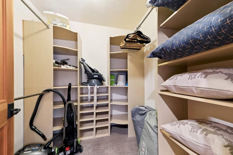 Upstairs king bedroom walk in closet.