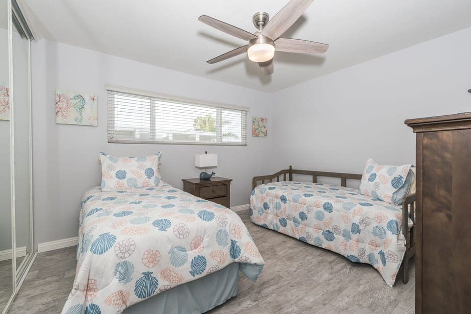 The third bedroom includes 2 twin beds and an additional twin trundle bed as well as Roku TV.
                
