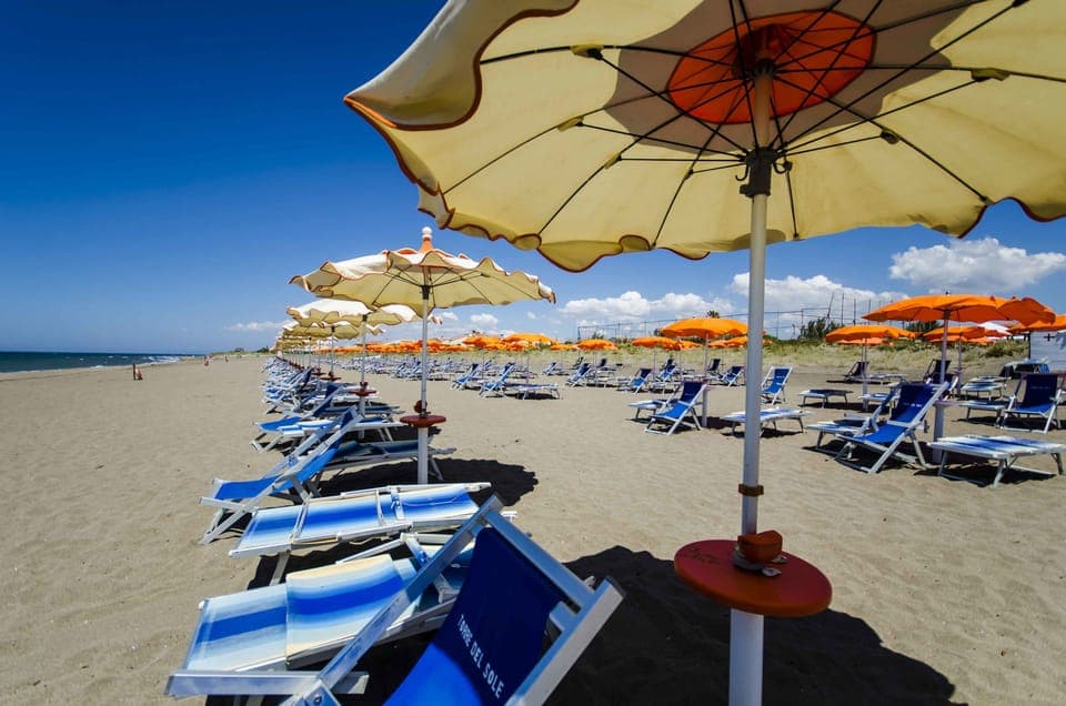 Private beach, sun loungers, beach umbrellas, windsurfing