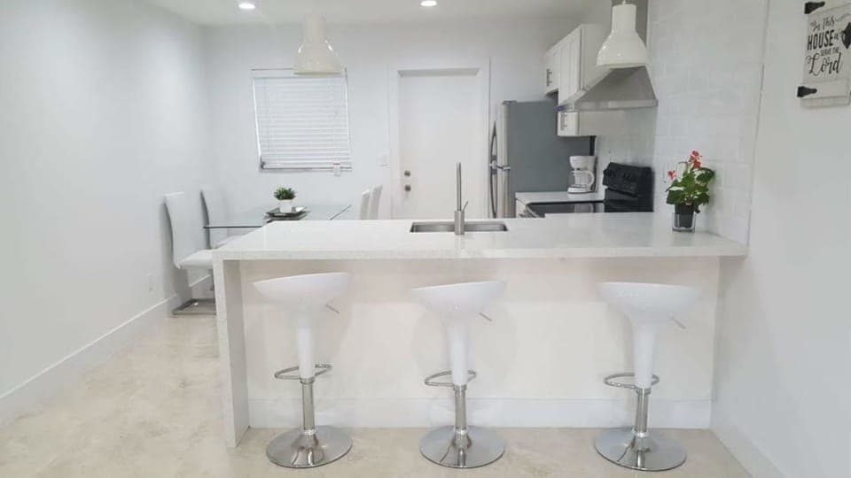 Come enjoy a modern style home and newly renovated 2 BR duplex apartment.