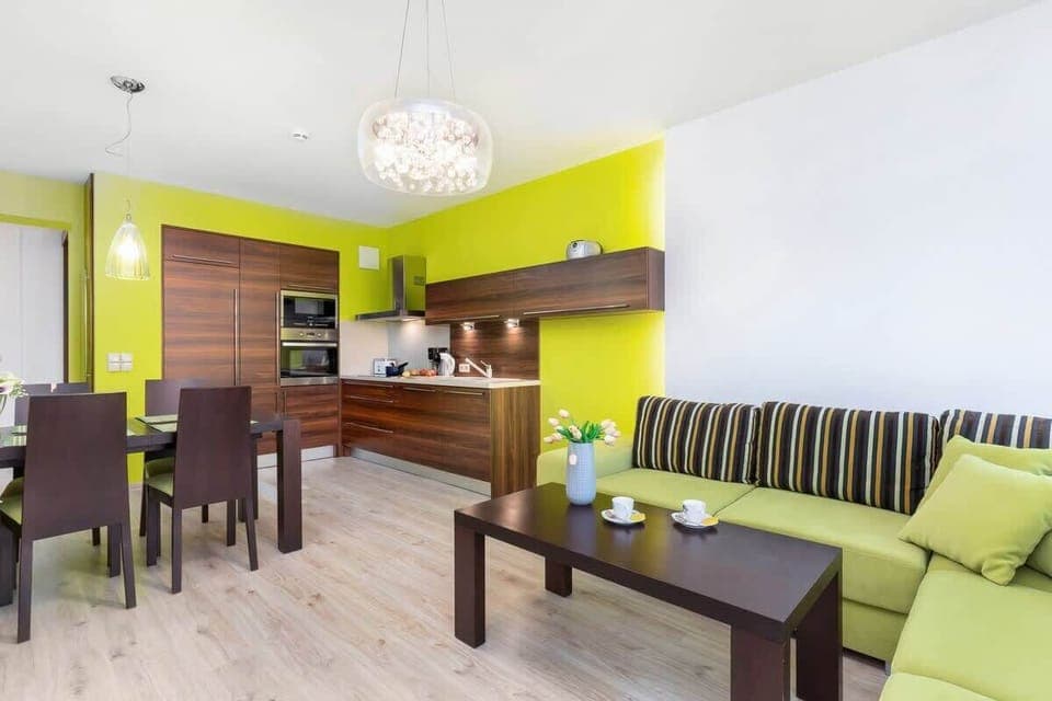 Living room with a comfortable sofa and TV. 