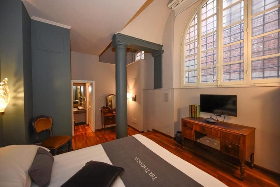 Superior Room | Minibar, in-room safe, individually furnished, blackout drapes