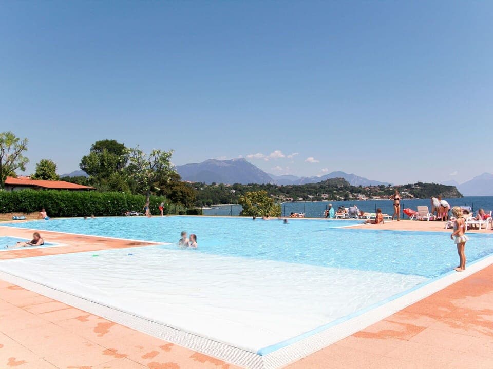 Sky, Water, Swimming Pool, Azure, Mountain, Tree, Leisure, Resort Town, Shade, Recreation